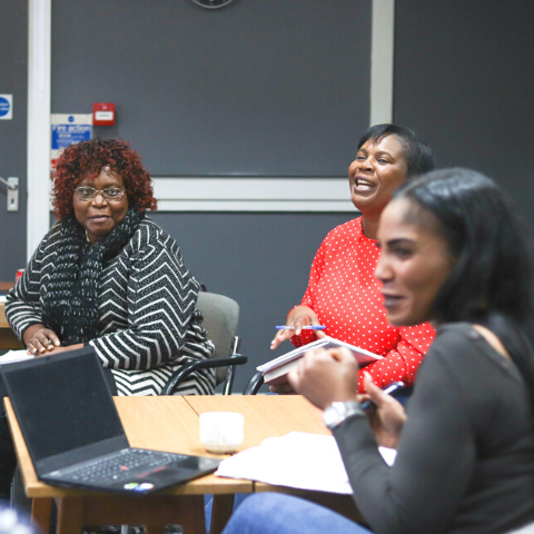 Group of Social Workers talking together