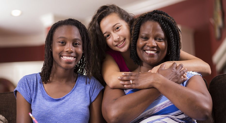 Mother and two teenage girls